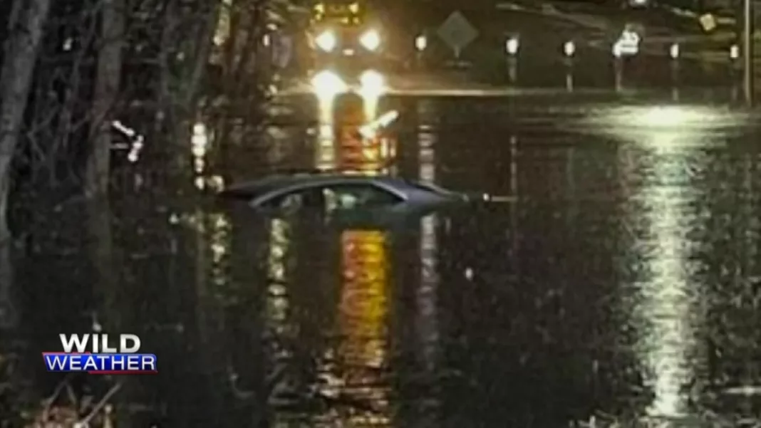 Driver describes rescue after car stuck on flooded Norwood street