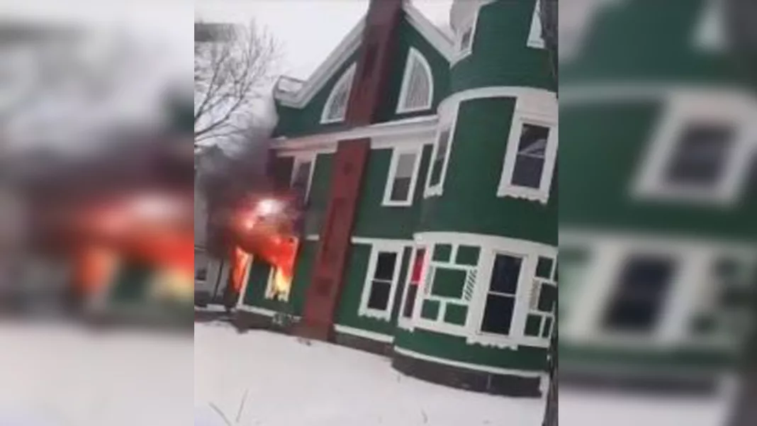 Firefighters save residents from burning Lawrence home