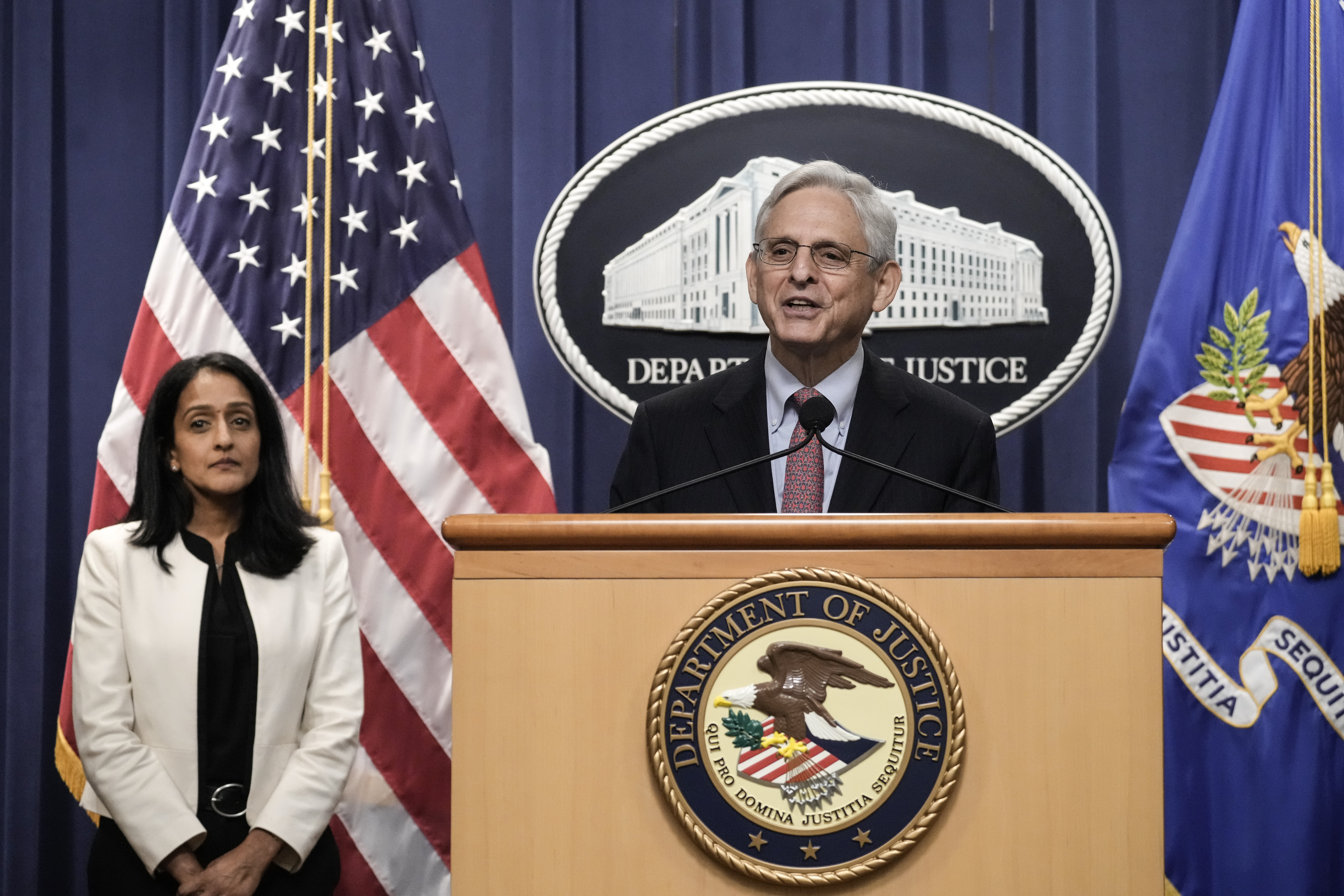 WASHINGTON, DC - AUGUST 2: (L-R) Associate Attorney General Vanita Gupta looks on as U.S. Attorney Merrick Garland speaks during a news conference at the U.S. Department of Justice August 2, 2022 in Washington, DC. Garland announced that the U.S. Department of Justice has filed a lawsuit seeking to block Idaho's new restrictive abortion law. (Photo by Drew Angerer/Getty Images)