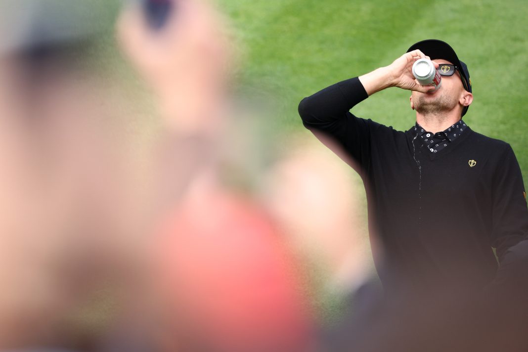 Mackenzie Hughes Energizes Fans with Beer Chug at 2024 Presidents Cup Opener